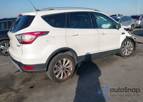 2017 Ford Escape Titanium z USA, uszkodzony, nr VIN 1FMCU0JD2HUB52235